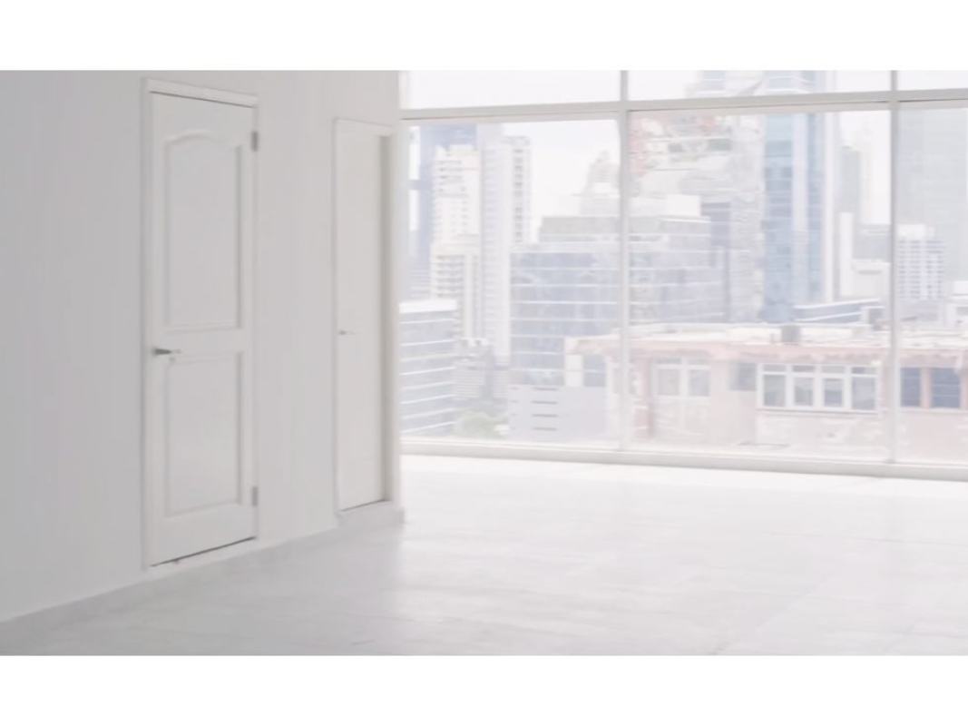 Spacious open commercial interior space with large floor-to-ceiling windows in Obarrio, Panama City