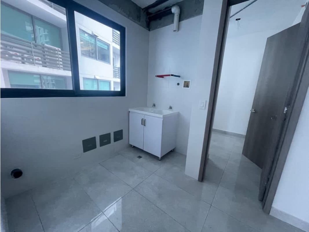 Laundry room with utility sink large window and hookups PH Ocean Front Punta Paitilla Panama