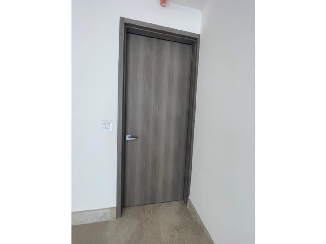 Minimalist hallway with modern interior grey doors in PH Ocean Front Punta Paitilla Panama