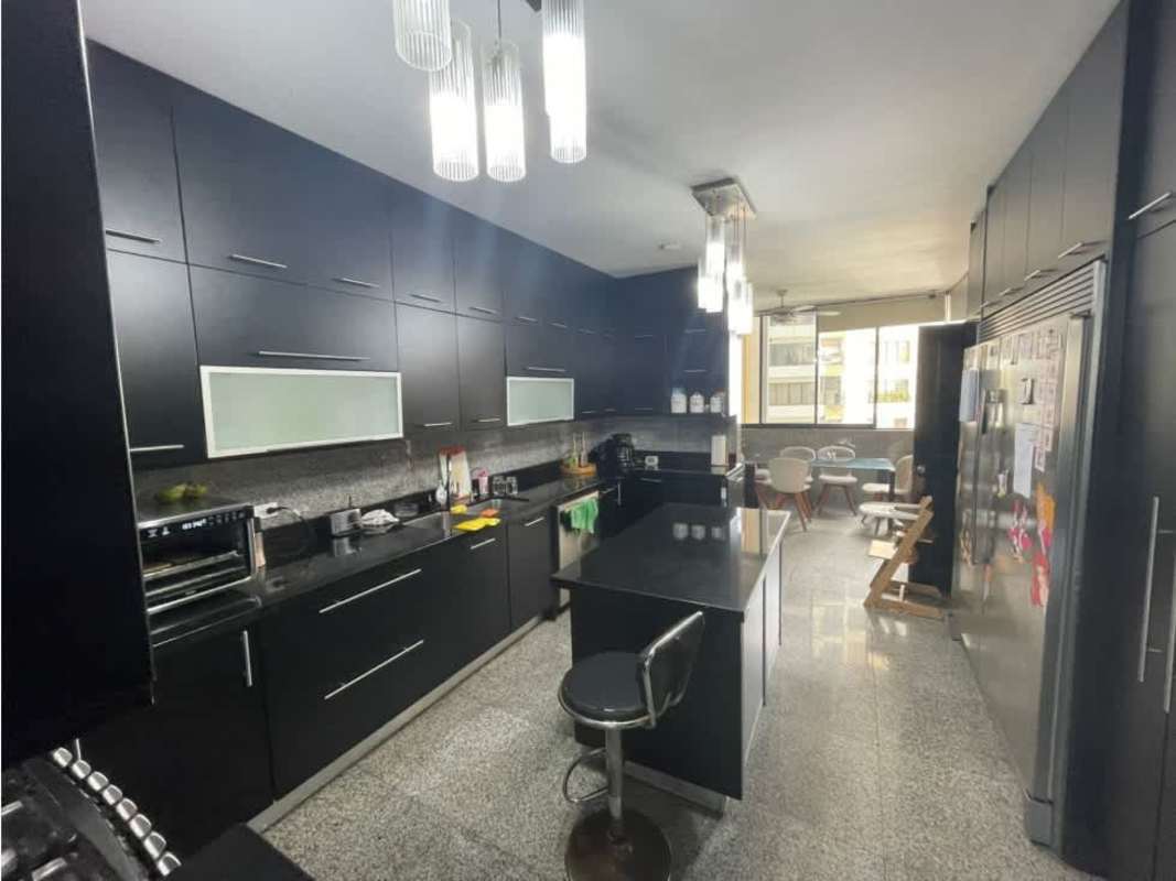 Spacious walk-in closet with shelves, hanging racks PH Villa Marina Punta Paitilla Panama