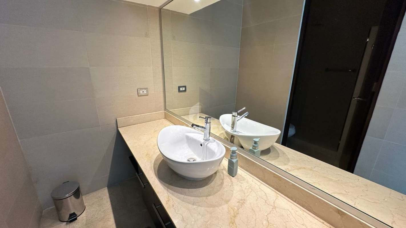 Contemporary bathroom with granite vanity, vessel sink, glass shower Sky Residences Avenida Balboa Panama