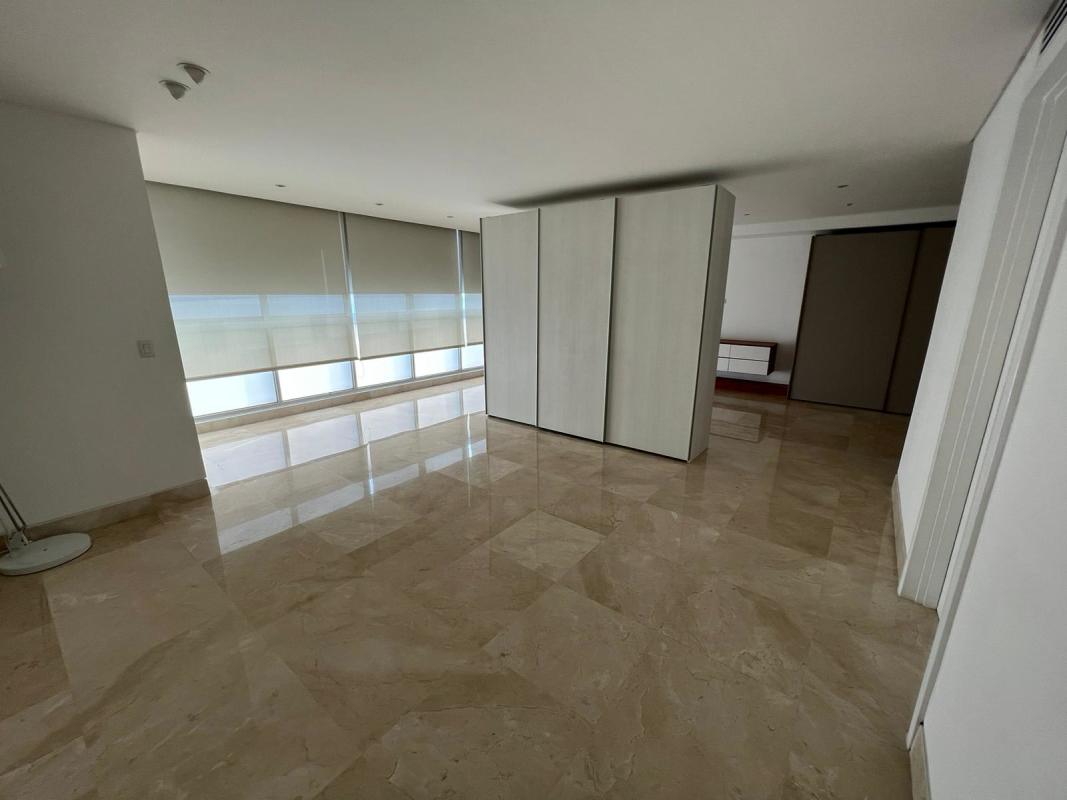 Spacious living area with marble flooring and terrace access Punta Pacifica Panama