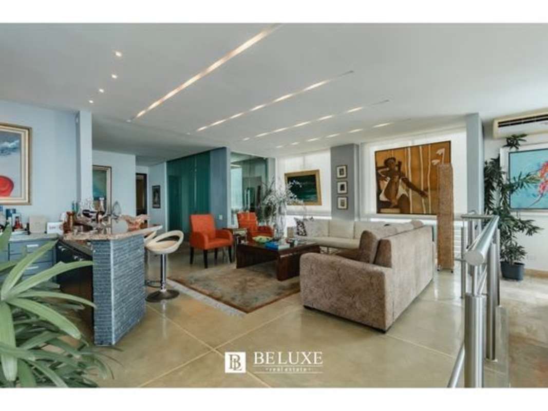 Open and semi-open terraces with panoramic ocean and city skyline at PH Premier Loft penthouse Panama City