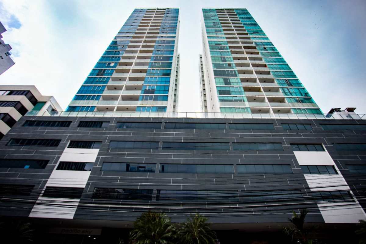 Modern twin tower facade glass balconies Pacific Sky Punta Paitilla Panama City