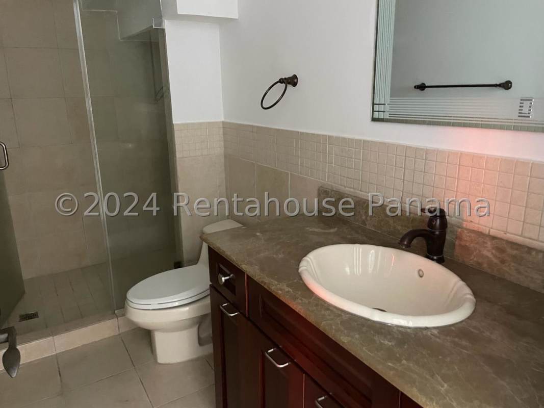 Updated bathroom featuring glass shower enclosure, granite counters and contemporary fixtures Casco Viejo Panama