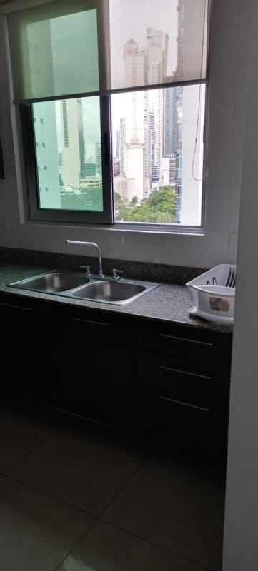 Kitchen double sink granite countertop large window city view PH Belle View Panama City