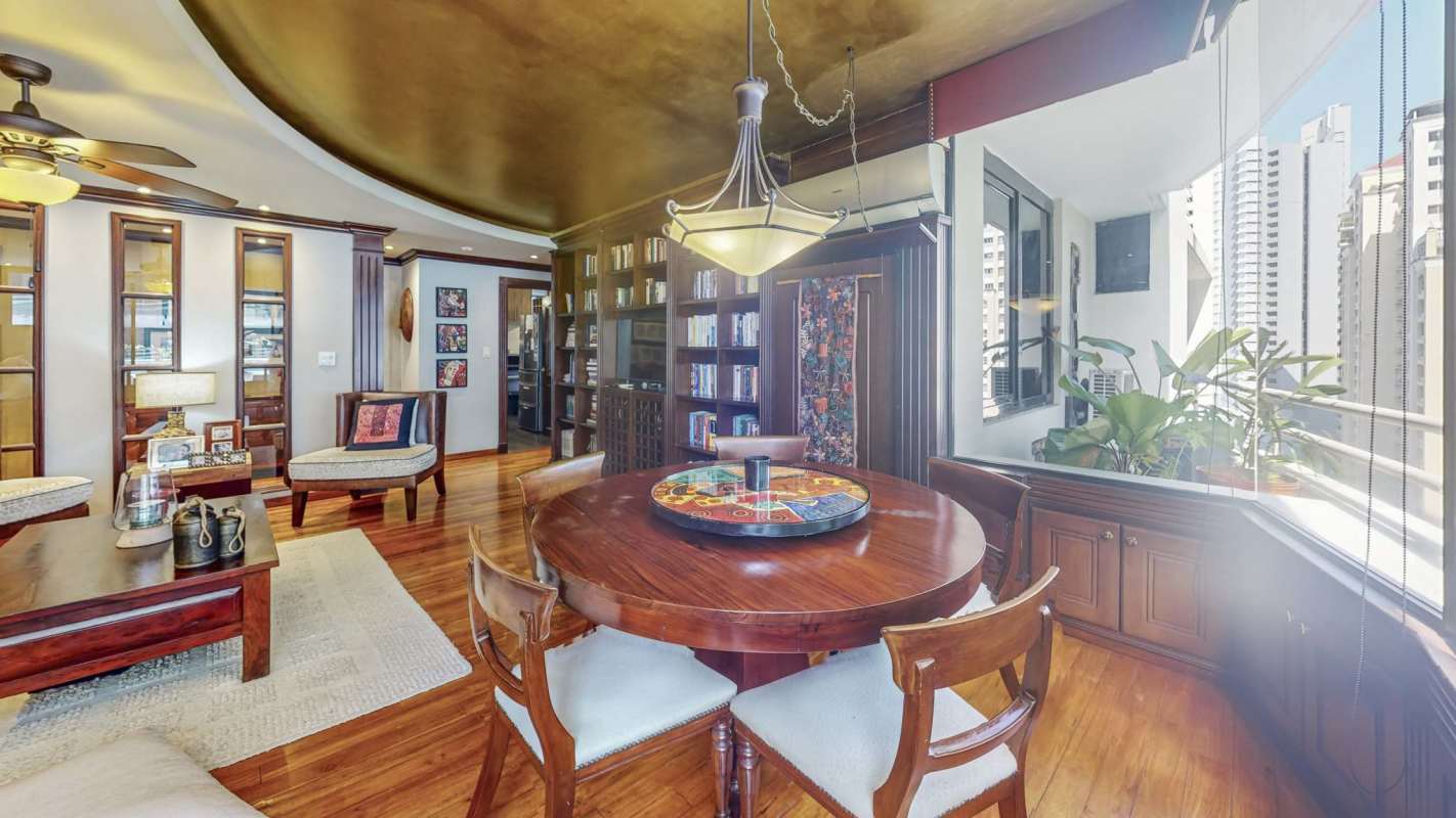 Kitchen with granite counters, wood cabinets, stainless appliances PH Brisas Obarrio