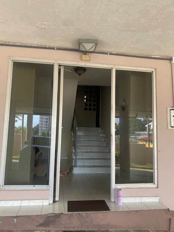 Loft area inside bedroom with window and white walls in PH Brisas del Sur Panama City