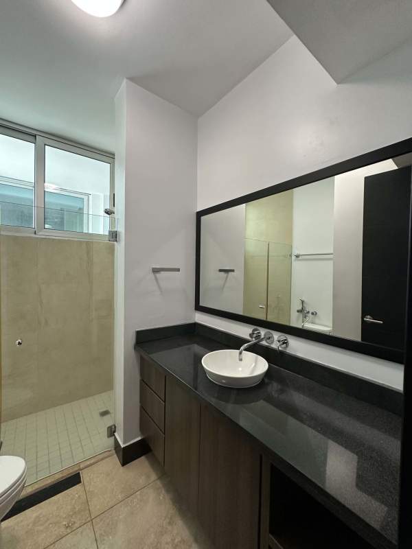 Bedroom with large windows and ocean view in luxury PH Ocean Sky condo Panama City