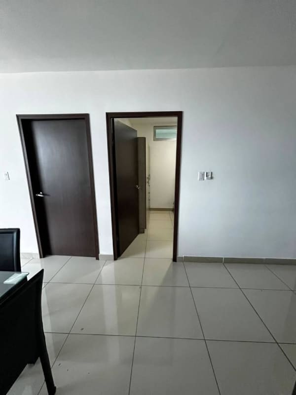 Modern entrance hallway tiled floors wooden doors Costa del Este rental