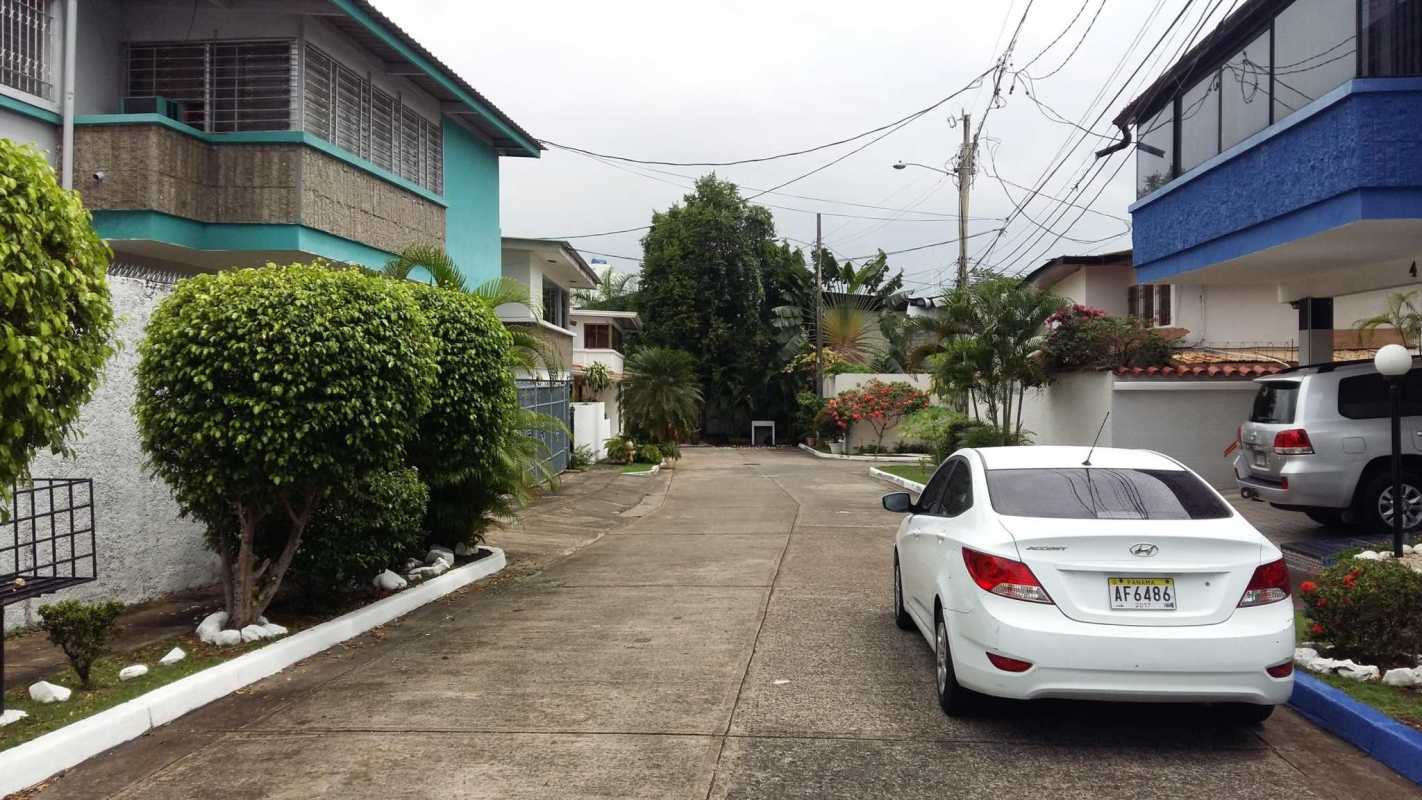 Small bathroom with vessel sink floating vanity white tiles Altos del Golf Panama