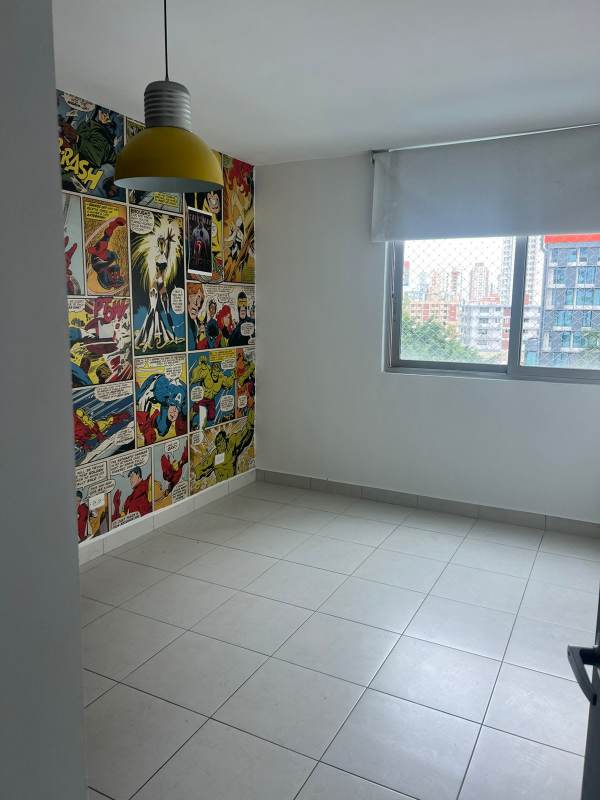 Bedroom with comic wallpaper and large window El Cangrejo PH Miro Panama