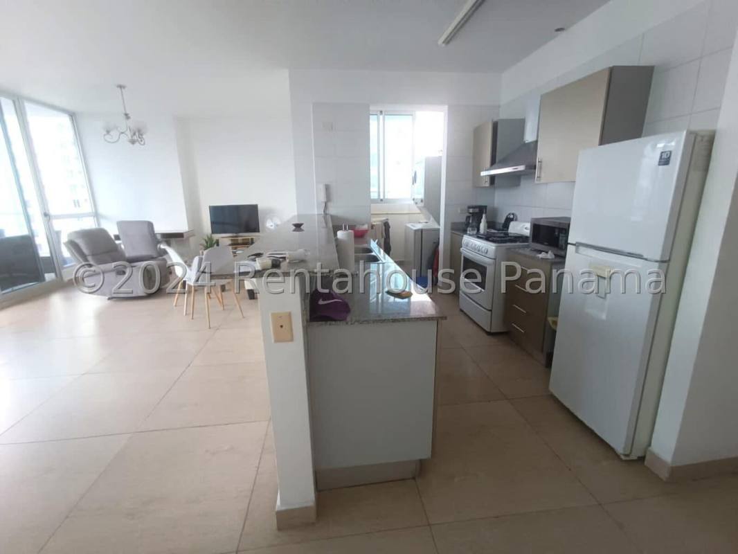 Modern living dining space with ocean view balcony at PH Bellavista Tower Panama City