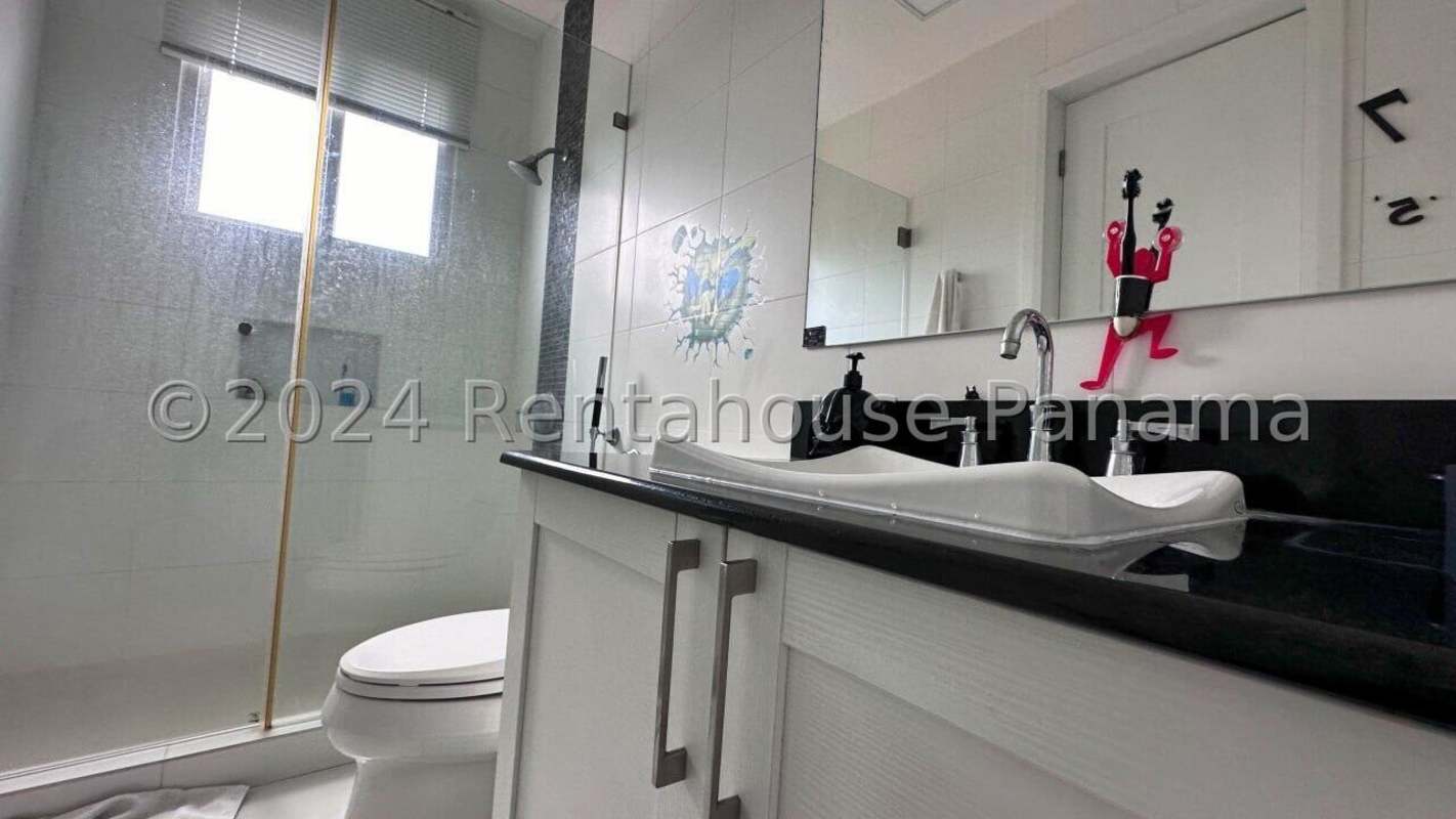 Modern luxury bathroom with double sink vanity glass shower Santa Maria home for sale