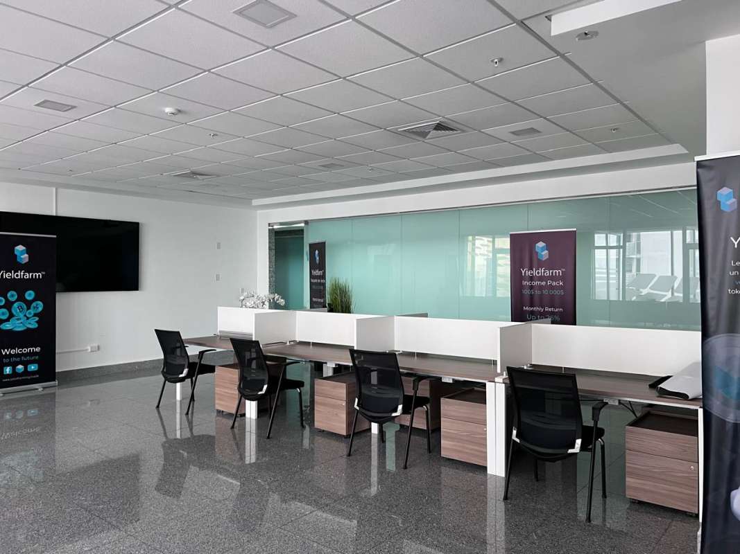 Modern corporate office space with workstations partitions and glass walls in PH BICSA Tower Panama City