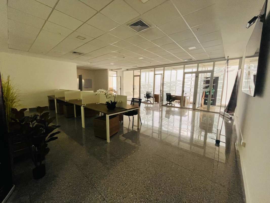 Bright window office workstations with skyline views PH BICSA Tower Panama City