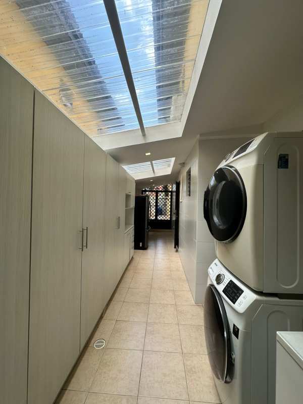 Spacious bright living room with marble floor and garden view at PH Antigua Costa del Este Panama