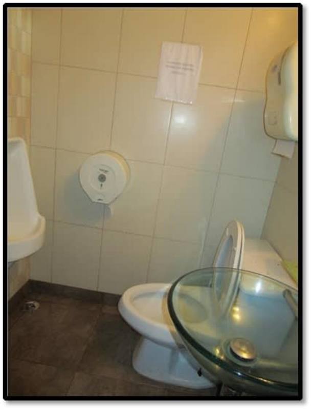 Home office study space with curved desk red accent wall commercial house Betania Panama