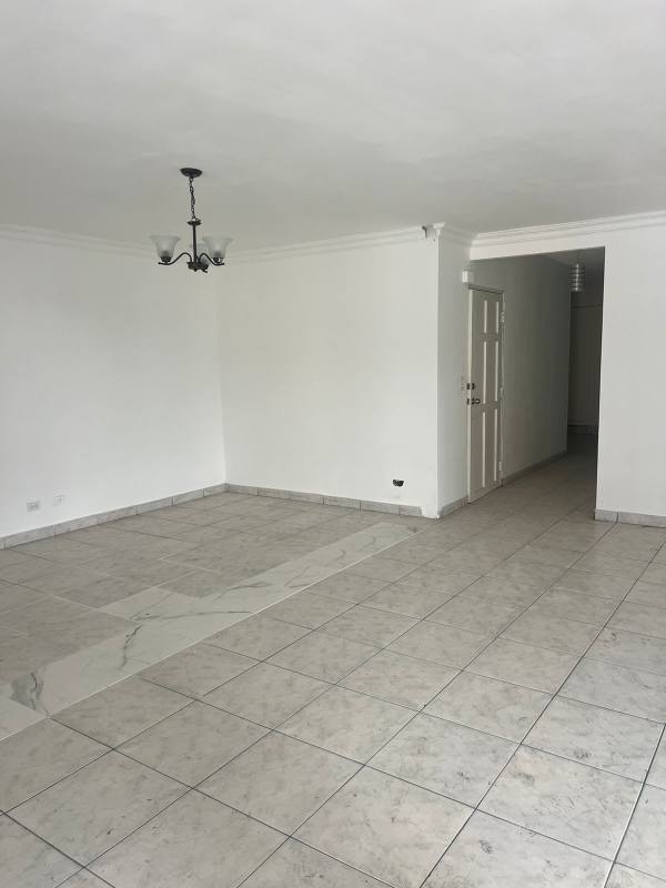 Spacious bedroom with built-in closets and tiled floor at PH Zahav Panama