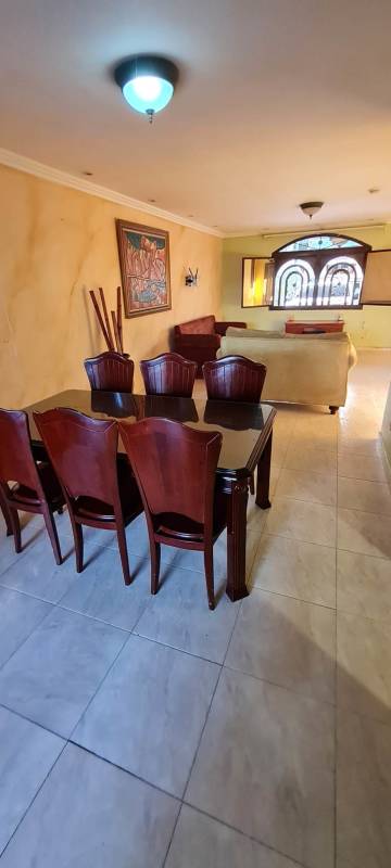 Walk-in closet with window shelves in master bedroom furnished house Panama