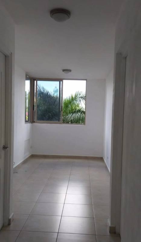 Minimalist hallway with large window and tiled flooring in PH San Francisco Bay Panama City