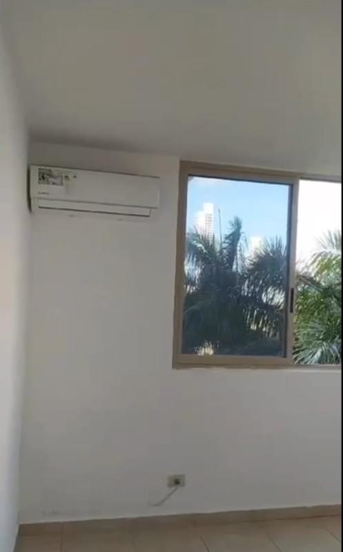 Minimalist bedroom, window and split AC in PH San Francisco Bay Panama