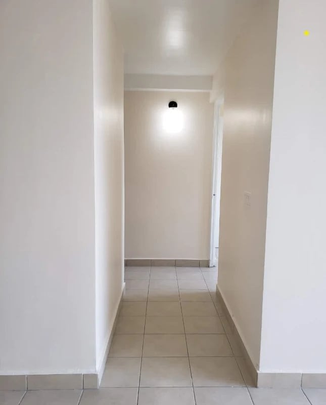 Modern lobby area with seating and elevator PH Residencial Via España Panama City