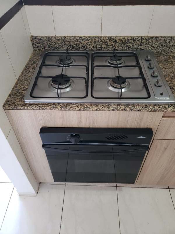 Modern granite kitchen with appliances gas stove and oven PH McGregor Valley