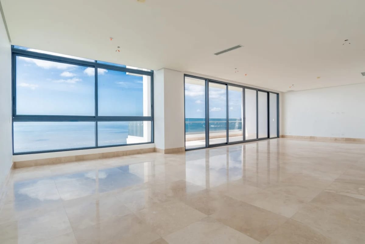 Modern living room floor-to-ceiling glass marble floors panoramic sea view PH Matisse Panama
