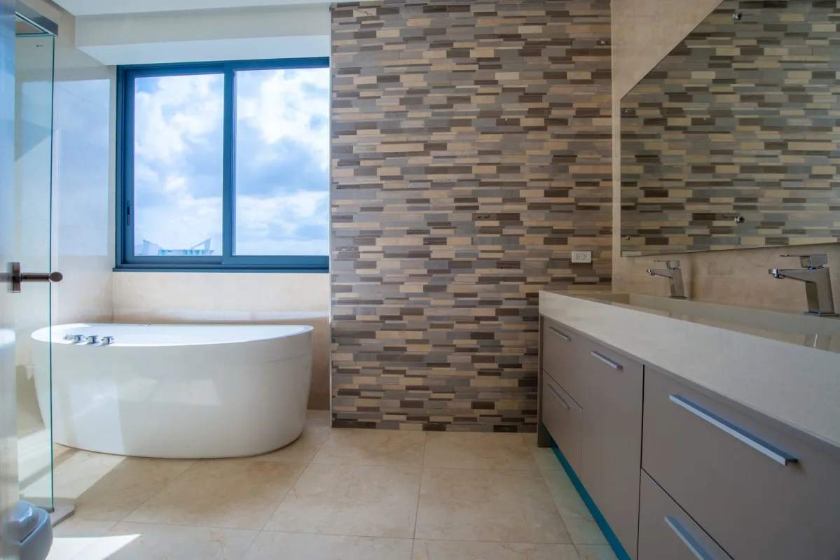 Modern bathroom free-standing tub skyline large window PH Matisse Costa del Este Panama