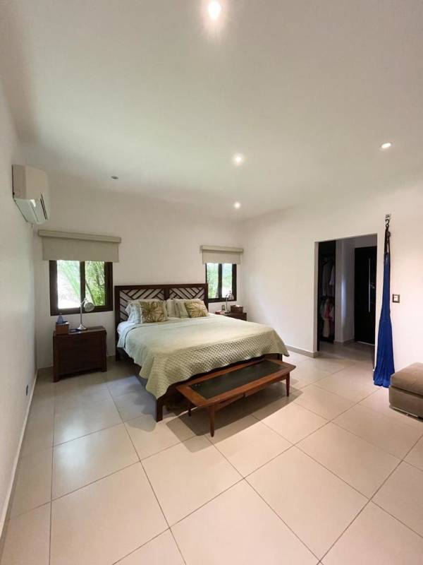 Large master bedroom with king bed walk-in closet AC Costa Sur Panama