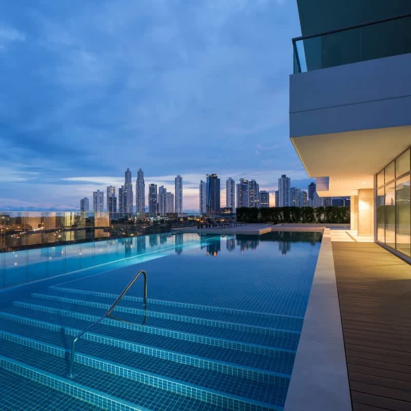 Spacious living area with panoramic views, marble floors, sliding doors to balcony at PH Green View Santa María Panama