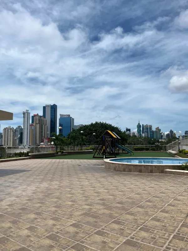 Modern gym with equipment and large windows city view PH San Francisco Bay Panama