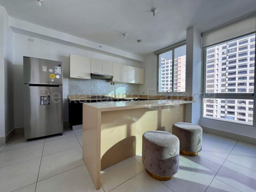 Fully equipped kitchen with island, mosaic backsplash and modern appliances in PH Costa View Tower Panama