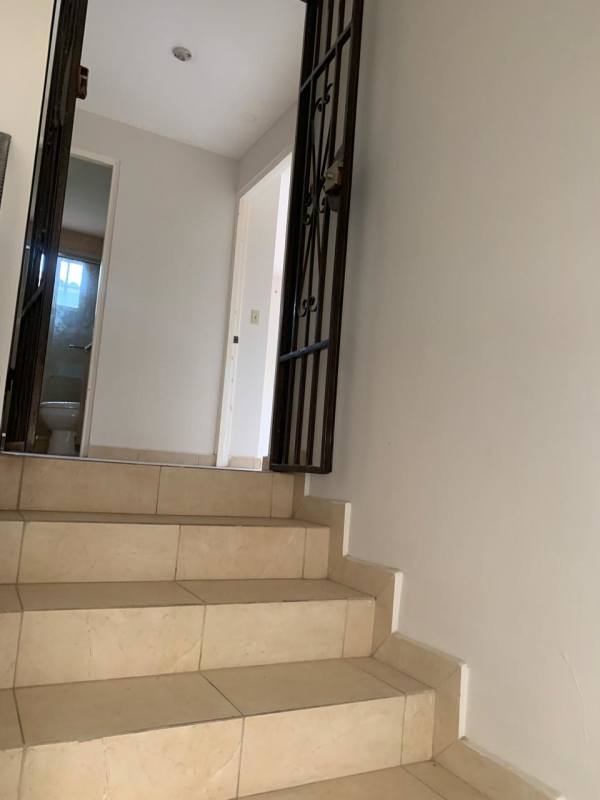 Spacious walk-in closet with built-in shelves and hanging space Villa Zaita Panama