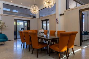 Outdoor kitchen BBQ area with brick oven and covered terrace Punta Paraíso Coronado Panama