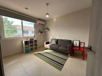 Dining room opening to terrace with garden view in Panama Pacifico townhouse
