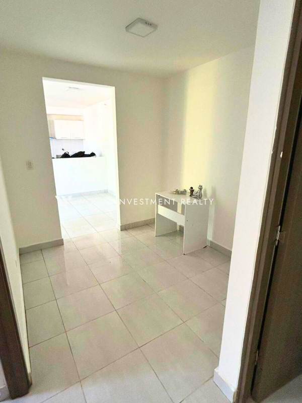 Bright hallway leading to kitchen in PH Metropolitan Park Panama City apartment rental