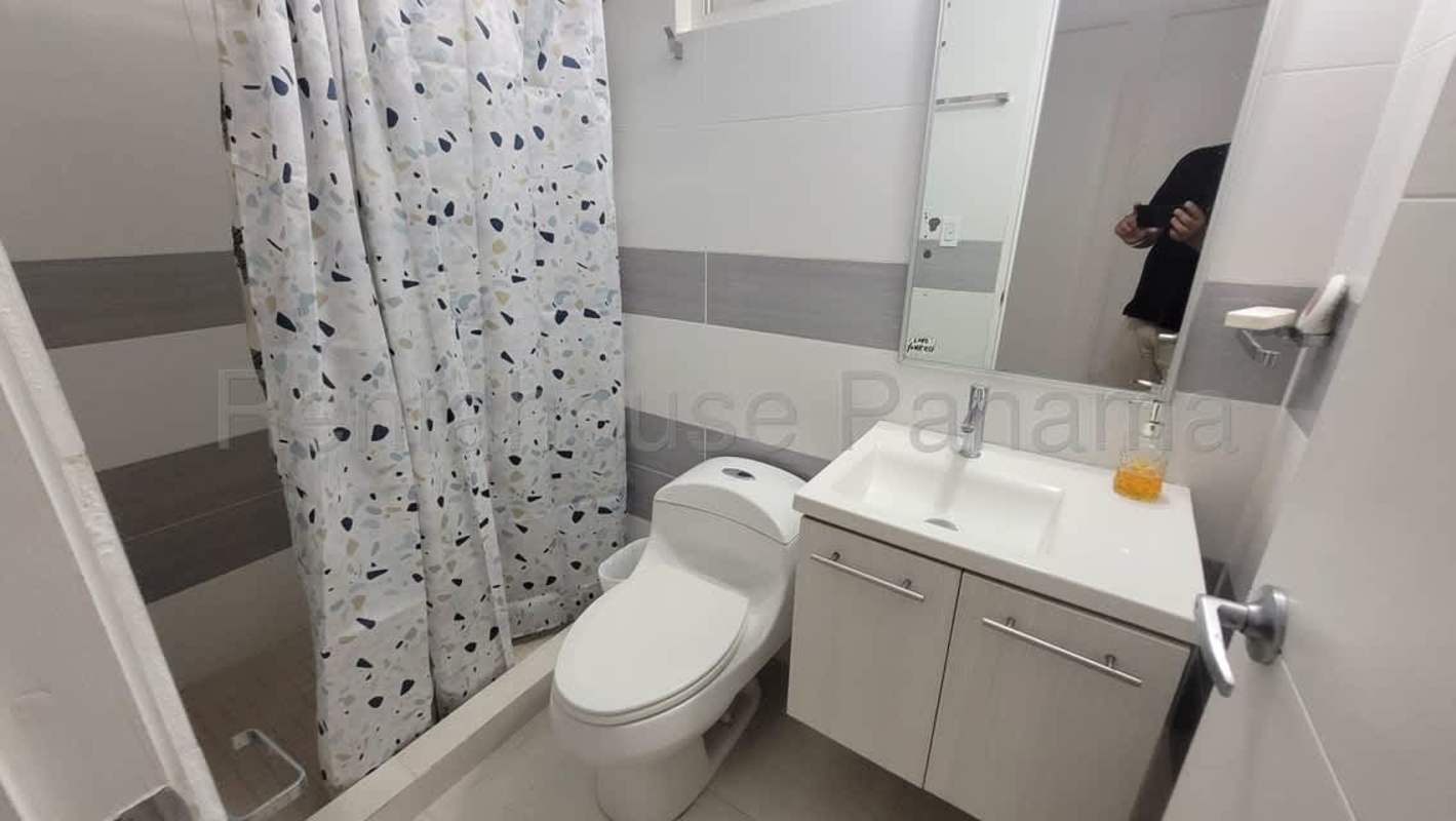 Bathroom with vanity, mirror, shower curtain, ceramic tiles apartment rental PH Versalles Panama