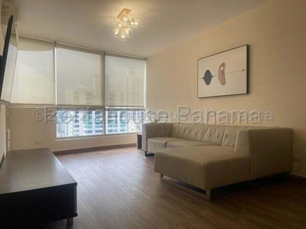 Open living area with large windows and wood style flooring in PH San Francisco Park
