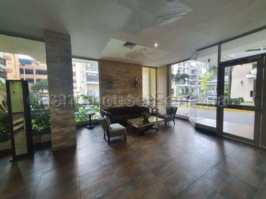 Spacious and bright lobby lounge with modern furniture in San Francisco Park Panama
