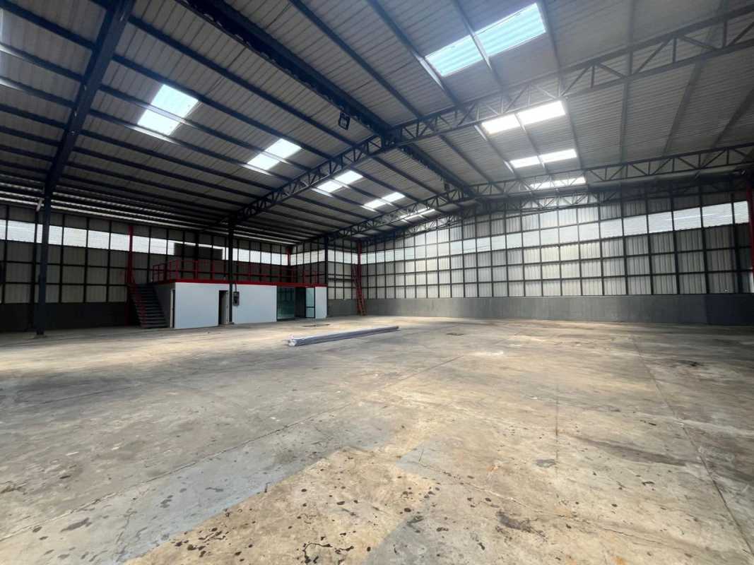 Industrial double height interior view mezzanine and steel beams Tocumen Panama