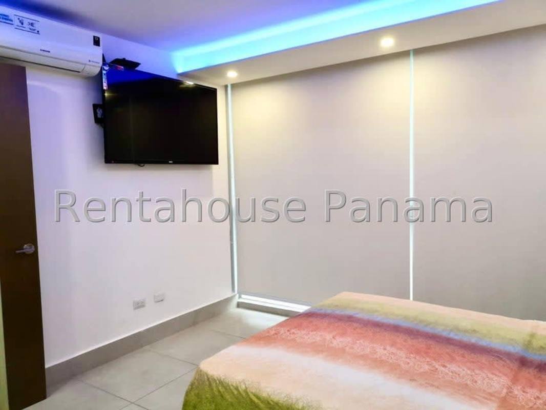 Bathroom with granite countertop, glass shower, and modern fixtures PH Park Loft Obarrio Panama