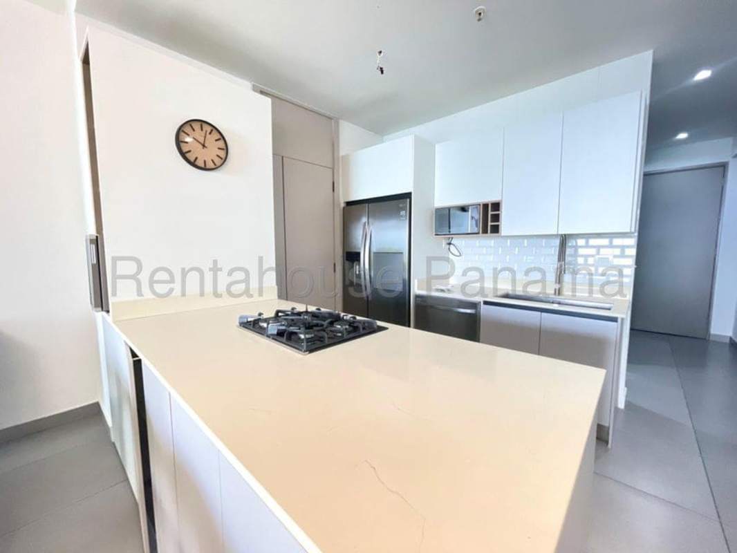 Fully equipped kitchen with island, gas stove, appliances at PH Element Avenida Balboa Panama