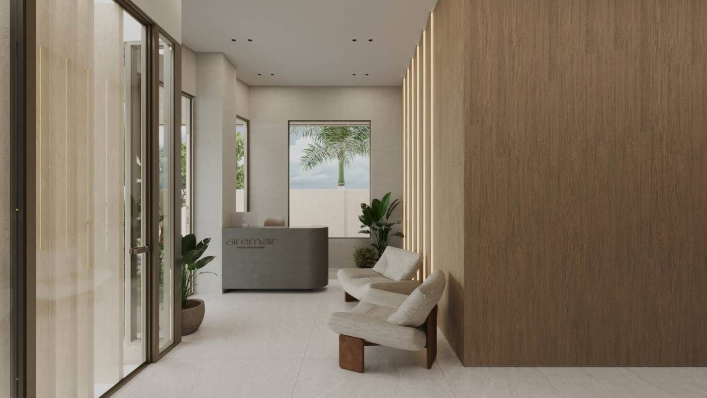 Modern minimalist lobby with wood accents plants floor to ceiling windows Ocean Reef Islands Panama