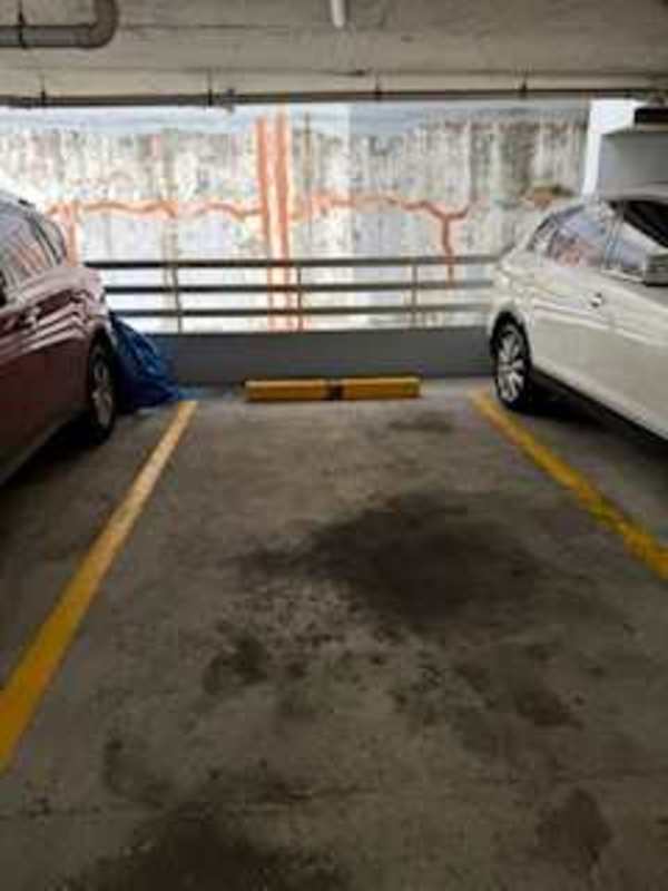 Covered parking space inside secured garage of PH Barcelona View Carrasquilla Panama