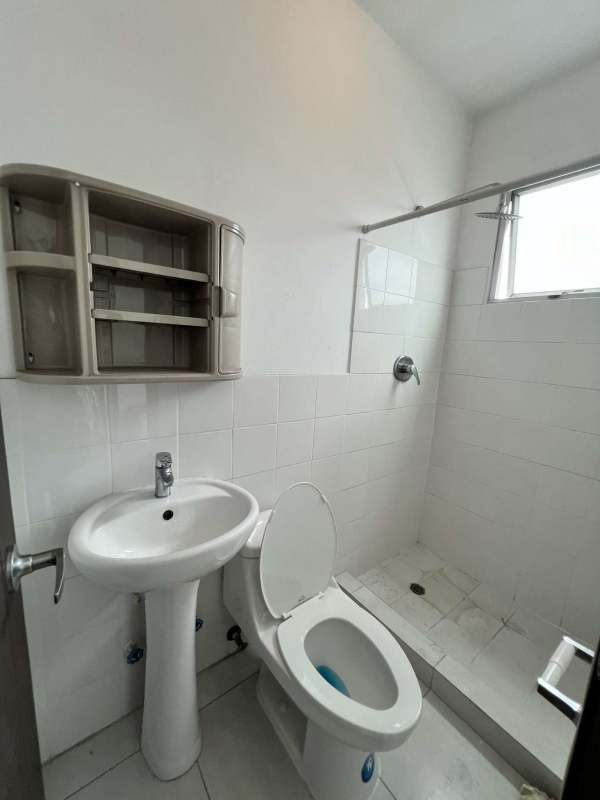 Modern bathroom with glass shower granite vanity PH Trinity Tower El Carmen Panama