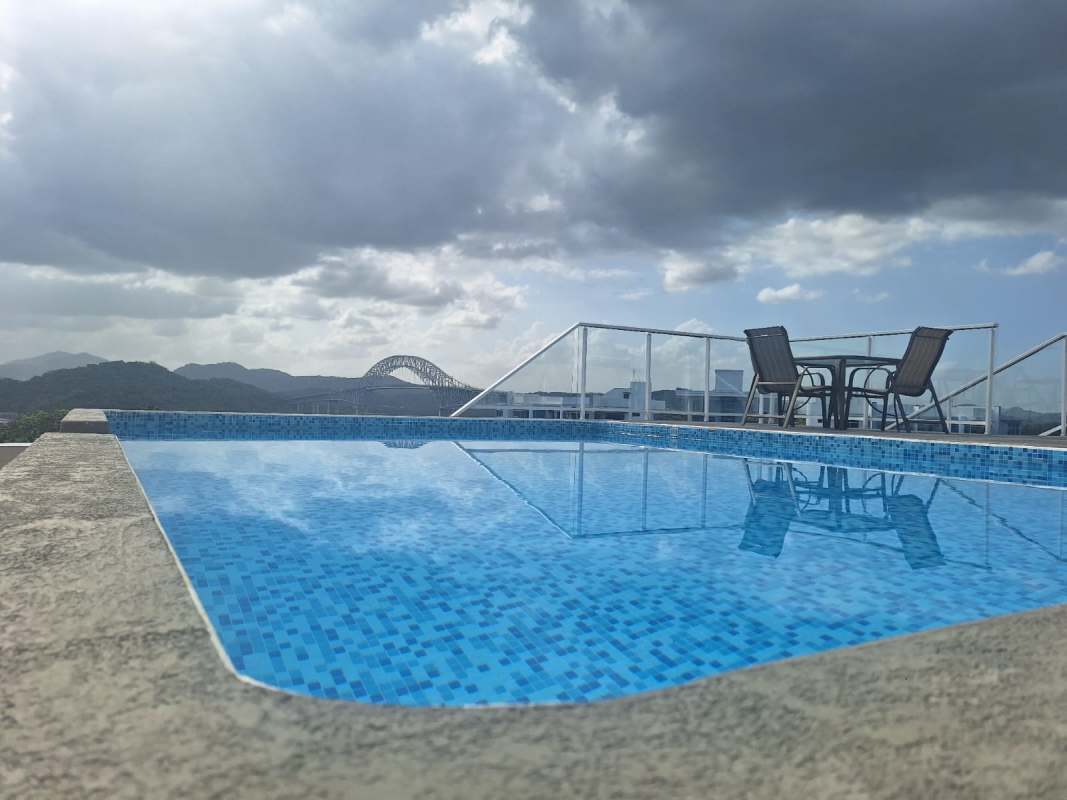 Spacious furnished living room with balcony, mountain and city views PH Amador Hill Amador Causeway Panama