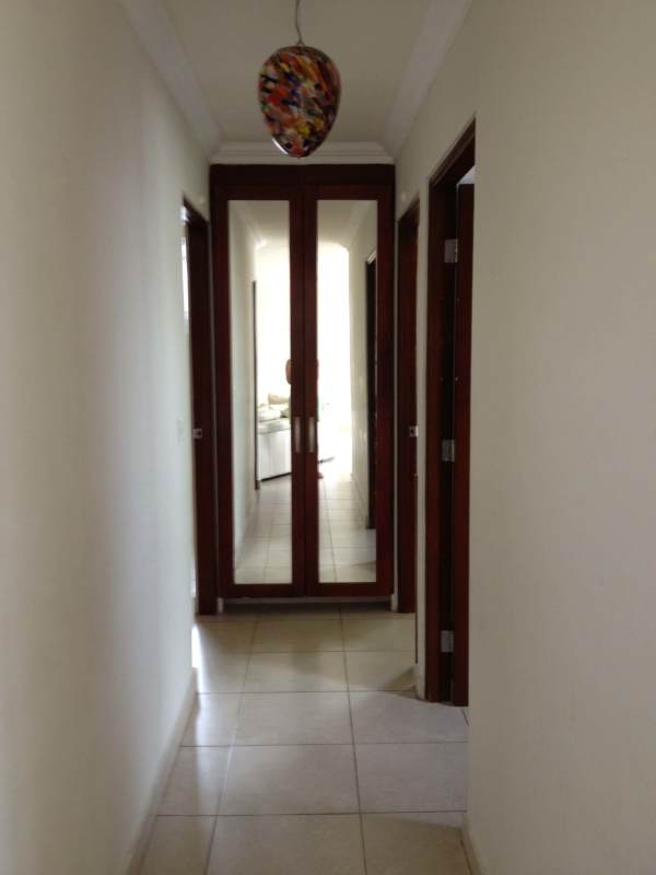 Hallway with mirrored doors, tile flooring, ceiling lamp PH Onyx El Cangrejo Panama