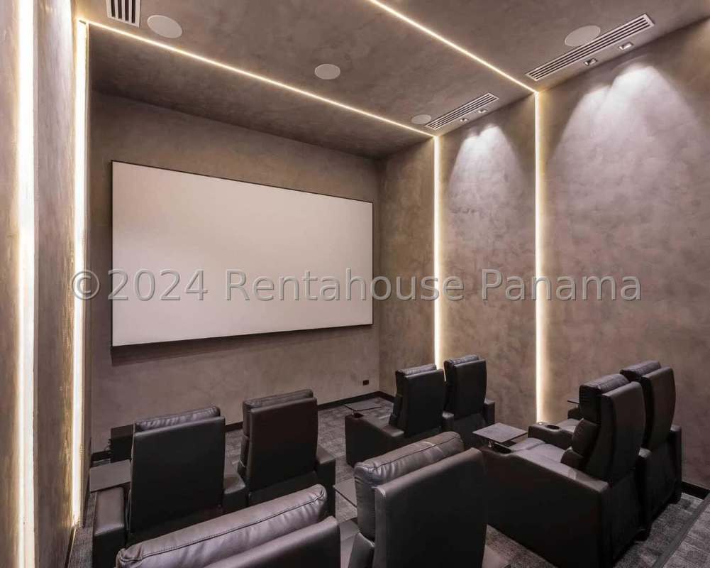 Private home theater room with recliners and projector in PH Victory Sport Panama